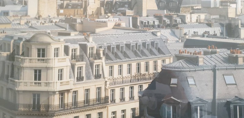 Quel est le prix au mètre carré dans un appartement au dernier étage avec ascenseur sur le 17e arrondissement de Paris quartier des batignolles.